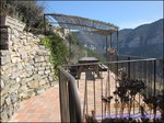 A vendre par Tarn Aveyron Immobilier Caractere, secteur Millau, aveyron,Hameau à vocation touristique composé de 4 maisons idéalement situé au pied d'un château médiéval surplombant les Gorges du Tarn.