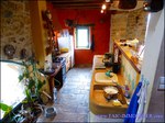 A vendre par Tarn Aveyron Immobilier Caractere, secteur Millau, aveyron,Hameau à vocation touristique composé de 4 maisons idéalement situé au pied d'un château médiéval surplombant les Gorges du Tarn.