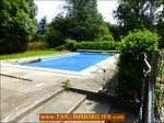 A vendre par TAIC Immobilier Graulhet Maison de Maître sur 7,5 hectares avec piscine et dépendances, boxes chevaux, prairie, puits