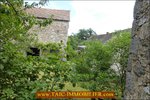 A vendre par Tarn Aveyron Immobilier Caractère, secteur Villefranche de Rouergue, La Fouillade,12, Aveyron, corps de ferme à rénover de 150m2 sur 4 hectares, dépendances,granges,prairie,calme,source,taic immobilier,agence immobilière cordes sur ciel