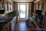 A vendre par TAIC Immobilier agence immobilière à cordes sur ciel, secteur Cordes sur Ciel propriété de 860m2 sur 5 hectares, cuisine pro, salle de restaurant, puits.