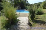 A vendre Cordes sur ciel belle Maison en pierre blanche sur 220m2 et 1 hectare de parc et prairie. Piscine.