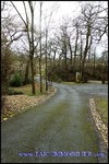 A vendre par TAIC Immobilier à Castres Grande longère de 1000m2 sur 8900m2 de terrain comprenant partie privative, 7 studios et dépendances,puit,lavoir.