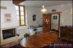 A vendre par TAIC Immobilier à Castres Grande longère de 1000m2 sur 8900m2 de terrain comprenant partie privative, 7 studios et dépendances,puit,lavoir.