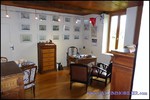A vendre par TAIC Immobilier à Castres Grande longère de 1000m2 sur 8900m2 de terrain comprenant partie privative, 7 studios et dépendances,puit,lavoir.