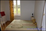 A vendre par TAIC Immobilier à Castres Grande longère de 1000m2 sur 8900m2 de terrain comprenant partie privative, 7 studios et dépendances,puit,lavoir.