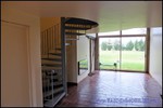 A vendre par TAIC Immobilier à Castres Grande longère de 1000m2 sur 8900m2 de terrain comprenant partie privative, 7 studios et dépendances,puit,lavoir.