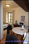 A vendre par TAIC Immobilier à Castres Grande longère de 1000m2 sur 8900m2 de terrain comprenant partie privative, 7 studios et dépendances,puit,lavoir.