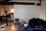 A vendre par TAIC Immobilier à Castres Grande longère de 1000m2 sur 8900m2 de terrain comprenant partie privative, 7 studios et dépendances,puit,lavoir.