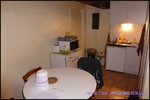 A vendre par TAIC Immobilier à Castres Grande longère de 1000m2 sur 8900m2 de terrain comprenant partie privative, 7 studios et dépendances,puit,lavoir.