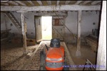 A vendre par TAIC Immobilier à Castres Grande longère de 1000m2 sur 8900m2 de terrain comprenant partie privative, 7 studios et dépendances,puit,lavoir.