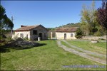 A vendre par Taic Immobilier : Cordes sur Ciel ancien corps de ferme sur 6 hectares et ses dépendances, vue sur Cordes, puits
