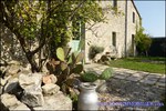 A vendre par TAIC Immobilier Secteur Cuq-Toulza Belle longère de 350m2 avec son gite de 60m2 dépendances sur 2 hectares en situation dominante.
