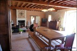 A vendre par TAIC Immobilier Secteur Cuq-Toulza Belle longère de 350m2 avec son gite de 60m2 dépendances sur 2 hectares en situation dominante.
