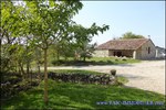 A vendre par TAIC Immobilier Secteur Cuq-Toulza Belle longère de 350m2 avec son gite de 60m2 dépendances sur 2 hectares en situation dominante.